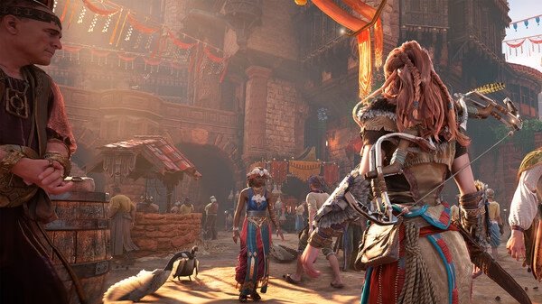 Screenshot from Horizon Zero Dawn™ Remastered showing the protagonist in a vibrant market scene with stone buildings and colorful banners.