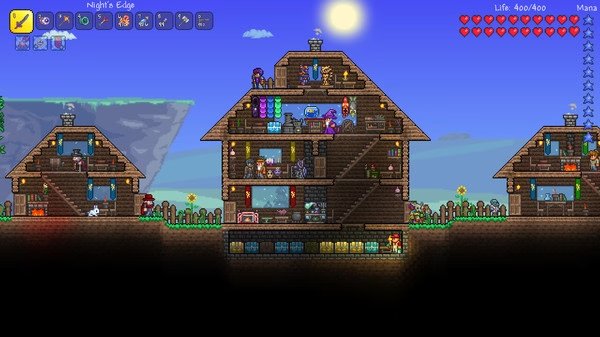 Screenshot of Terraria showing a detailed wooden house with several rooms, NPCs, and a clear blue sky in the background.