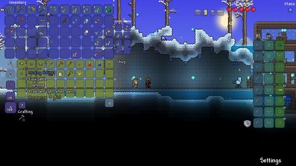 Screenshot of Terraria showing the player character in a snowy biome next to an NPC, with inventory and crafting menus open.