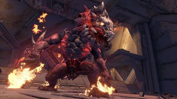 Borderlands 3 screenshot: A fierce, fiery creature with glowing eyes and rocky armor roars inside a damaged, dimly lit structure.
