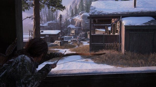 Screenshot from The Last of Us Part I, showing a character aiming a bow at enemies near rustic cabins in a snowy landscape.