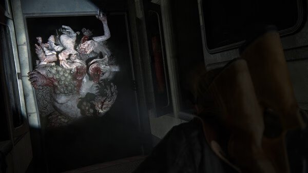 Screenshot from The Last of Us Part II Remastered showing a character facing a terrifying, mutated creature in a dimly lit corridor.