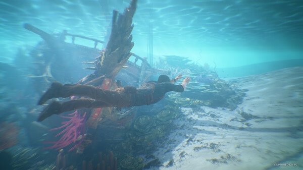 A screenshot from UNCHARTED: Legacy of Thieves Collection showing a diver swimming toward a sunken ship in an underwater scene.