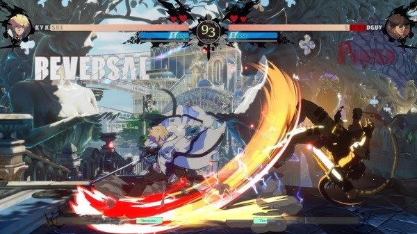 A dramatic battle scene from GUILTY GEAR -STRIVE- shows Ky Kiske executing a fiery attack. Screenshot displays intense action.