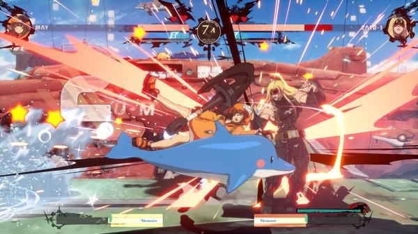 Screenshot from GUILTY GEAR -STRIVE- showing May mid-attack with a dolphin against another character amidst explosive effects.