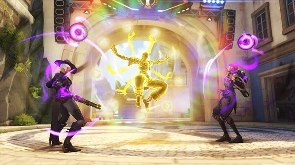 Overwatch® screenshot: Two heroes, Moira and Zenyatta, engage in battle in a vibrant arena, surrounded by colorful lights and energy.