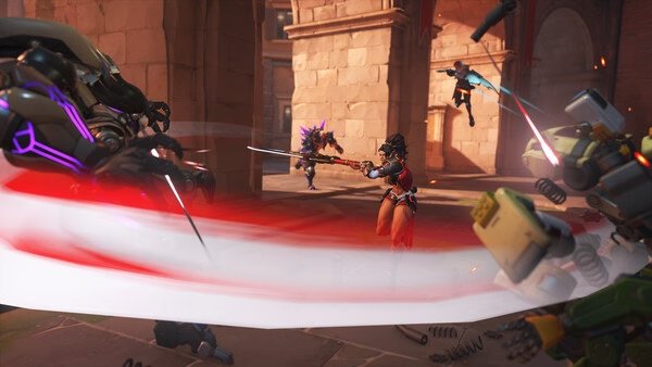 Overwatch® screenshot showing a fierce battle with heroes in action, swords clashing, and energy effects in a medieval setting.