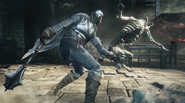 DARK SOULS™ III screenshot: A knight in armor battles a skeletal creature in a dimly lit, stone-floor room filled with debris.