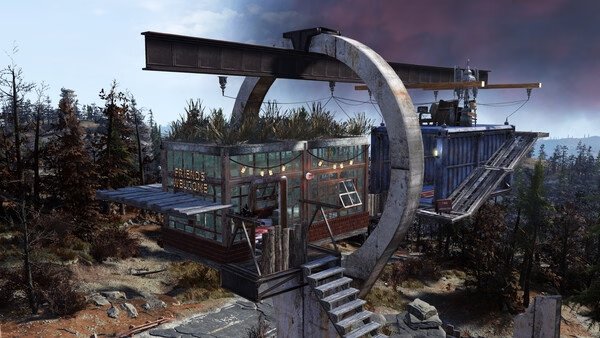 Screenshot of a custom-built base in Fallout 76, featuring a circular structure with a "Friends Welcome" sign amidst a forested landscape.