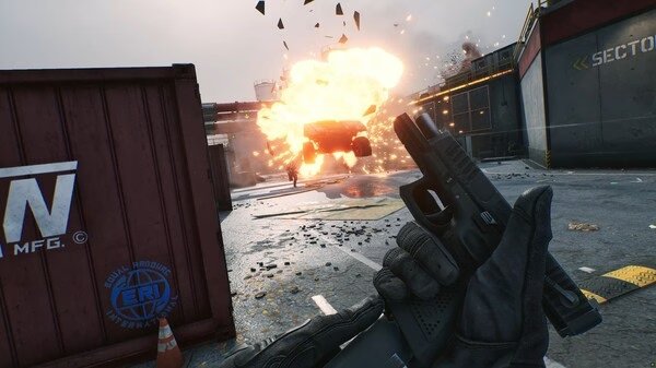 Delta Force screenshot: A player holds a handgun in the foreground while an explosion sends debris flying near shipping containers.