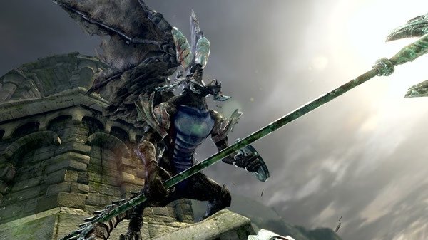 A screenshot from DARK SOULS™: REMASTERED shows a dragon-like creature wielding a large spear against a cloudy sky backdrop.
