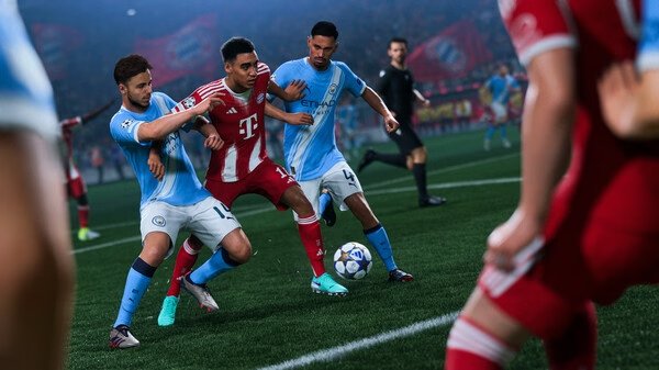 EA SPORTS FC™ 26 screenshot: Players from Manchester City and Bayern Munich compete for the ball in an intense match on the field.