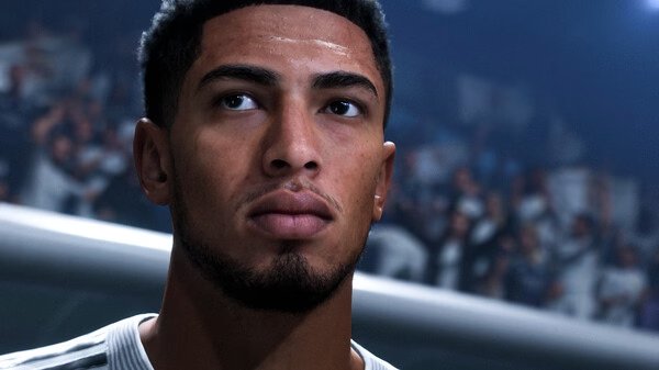 EA SPORTS FC™ 26 screenshot showing a close-up of a football player on the pitch with a blurred crowd in the background.