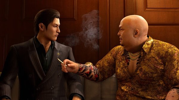 Screenshot from Yakuza Kiwami 3 & Dark Ties shows two characters in conversation, one holding a cigarette with smoke rising.