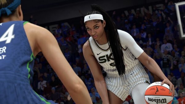 NBA 2K26 screenshot showing a player in a white-striped uniform dribbling a basketball, facing an opponent in a teal jersey.