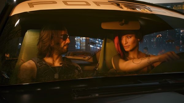 Cyberpunk 2077 screenshot: Two characters sit inside a futuristic car at night, with city lights visible through the windshield.