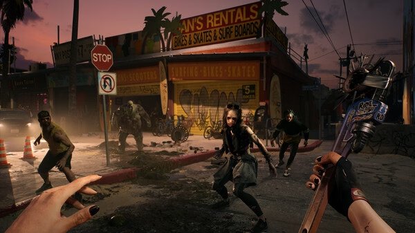 Dead Island 2 screenshot: A player faces off against multiple zombies on a dark urban street, holding a weapon ready to attack.