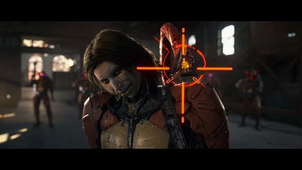 Screenshot from DEATH STRANDING 2: ON THE BEACH showing a character in armor targeted by a glowing red crosshair indoors.