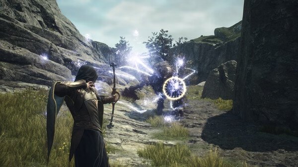 A mage casting a spell at a creature in a rocky landscape in Dragon's Dogma 2 screenshot, with magical effects visible.
