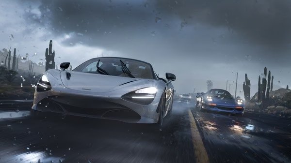Screenshot from Forza Horizon 5 showing two sleek sports cars racing on a wet road under a stormy sky with cacti in the background.