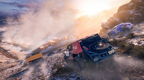 Screenshot from Forza Horizon 5 showing off-road vehicles racing on a rugged, snowy mountain terrain at sunset.