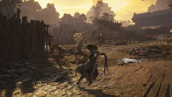 Screenshot from Phantom Blade Zero showing a warrior with a sword advancing in a rustic village landscape at sunset.