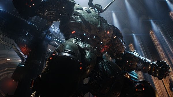 A screenshot from DOOM: The Dark Ages showing a towering armored demon in a dimly lit, cathedral-like environment.
