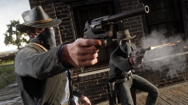 Screenshot from Red Dead Redemption 2 showing two masked cowboys aiming revolvers in an intense standoff scene.
