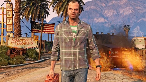 Screenshot from Grand Theft Auto V showing a character walking with a gas can in hand, with a burning vehicle in the background.