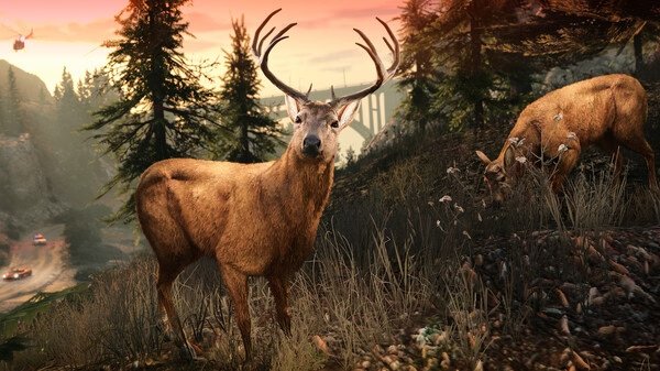 Grand Theft Auto V screenshot: A majestic deer stands alert in a forested area at sunset, with a bridge and another deer in the background.