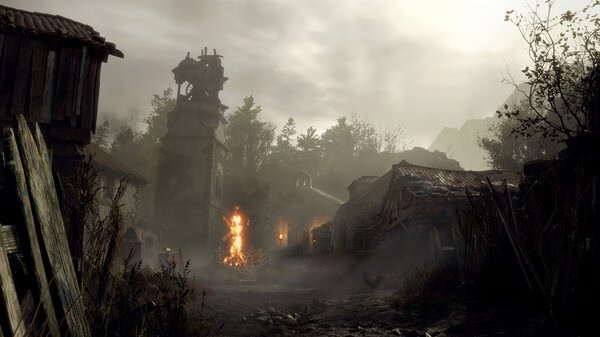 A Resident Evil 4 Remake screenshot showing a village with a fire, buildings, and a cloudy sky in the background.
