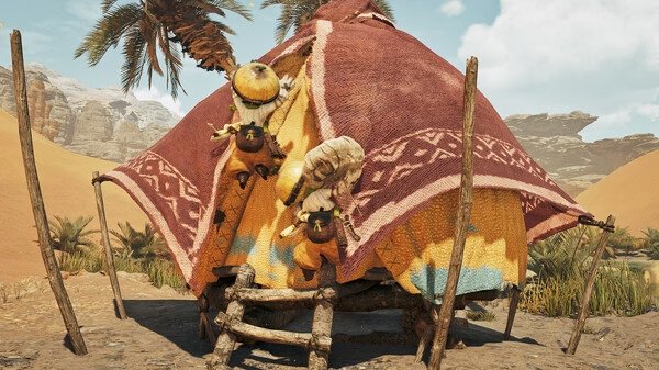 Screenshot from Monster Hunter Wilds showing a cozy desert hut with two small creatures climbing it under a clear blue sky.