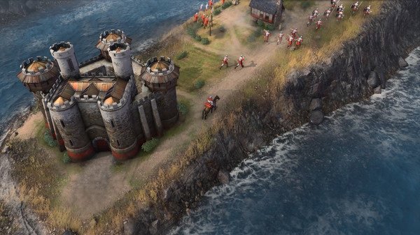 A screenshot of Age of Empires IV showing a castle on a cliffside, surrounded by soldiers near the ocean.