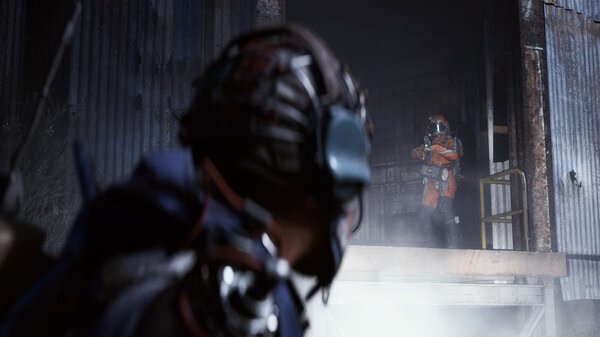 ARC Raiders screenshot: A player character in focus observes another armored figure standing in a misty, industrial setting.