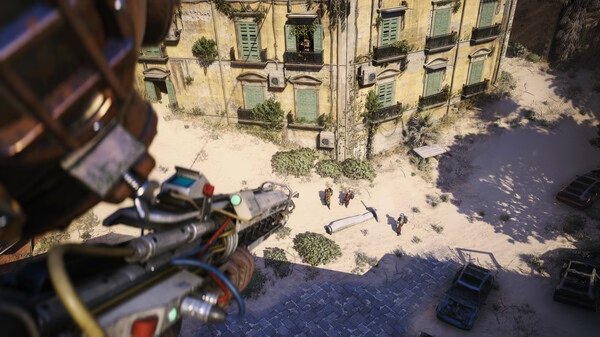 Screenshot from ARC Raiders showing a player aiming a weapon from a rooftop towards a group of enemies near an old building.