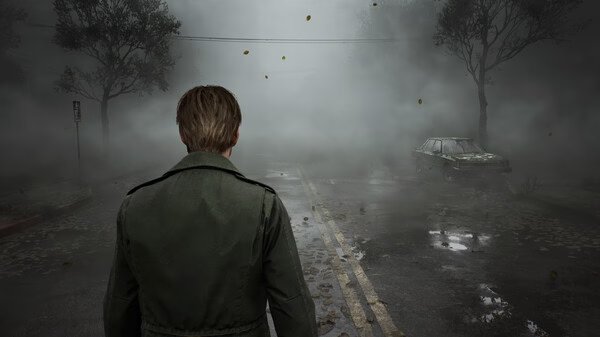 Silent Hill 2 screenshot: A man in a green jacket stands on a foggy road, facing an abandoned, weathered car surrounded by eerie mist.