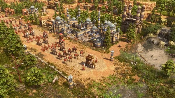 A screenshot from Age of Empires III: Definitive Edition shows a procession of camels and soldiers approaching a grand palace.