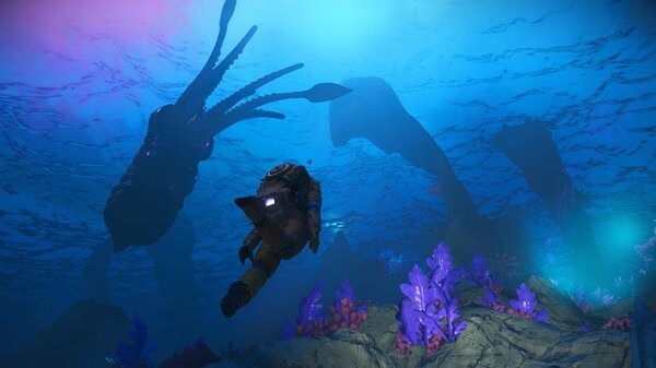 No Man's Sky screenshot of a diver exploring an underwater scene with vibrant coral and large aquatic creatures.
