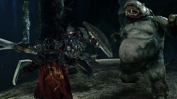 Screenshot from Dark Souls II: Scholar of the First Sin showing a knight battling a large hippo-like creature and an armored enemy.