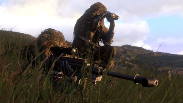 Arma 3 screenshot: A soldier in a ghillie suit uses binoculars while lying prone in tall grass, with hills in the background.