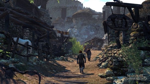Screenshot from Mount & Blade II: Bannerlord showing two characters walking through a medieval village with stone buildings.