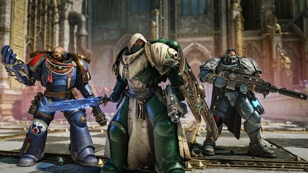 Screenshot from Warhammer 40,000: Space Marine 2 showing three armored Space Marines in a detailed, futuristic cityscape.