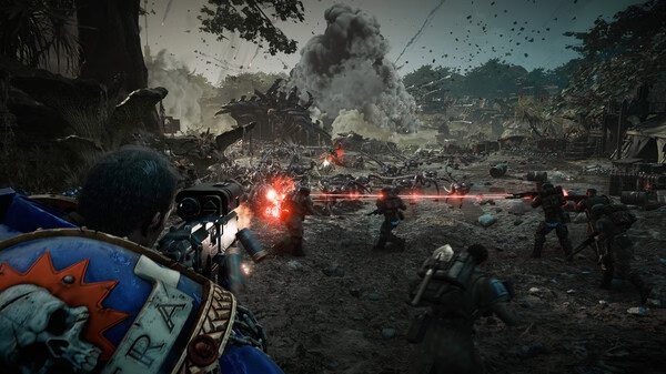 Warhammer 40,000: Space Marine 2 screenshot showing a battle scene with soldiers firing red lasers at enemies amidst a chaotic landscape.