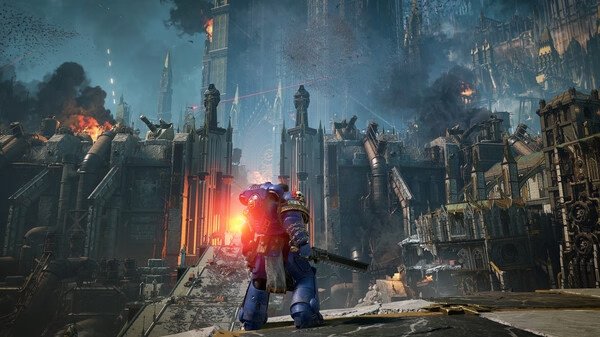 A Space Marine surveys a war-torn cityscape with smoke and fire in Warhammer 40,000: Space Marine 2 screenshot.