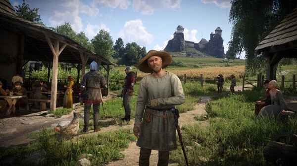 A screenshot from Kingdom Come: Deliverance 2 showing a medieval village scene with villagers near a castle in the background.