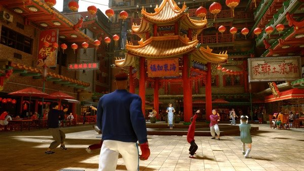 Street Fighter 6-Steam-NA screenshot: A fighter stands in a vibrant Chinatown square with lanterns, bystanders, and a pagoda in view.