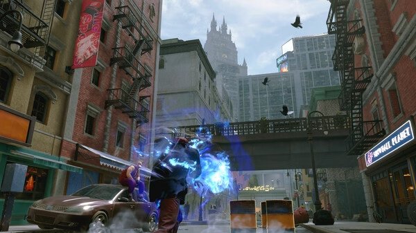 Street Fighter 6-Steam-NA screenshot: A character charges a blue energy attack in an urban street with buildings and birds overhead.