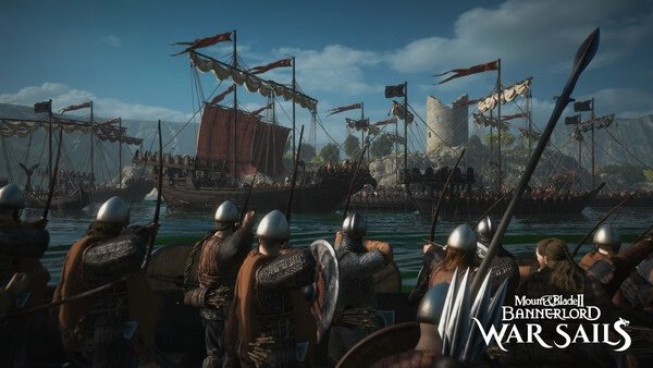 Mount & Blade II: Bannerlord Warband screenshot: Soldiers on boats approach a castle, preparing for battle under blue skies.